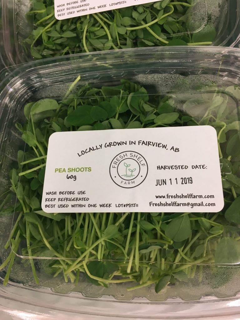 Pea microgreens 60 gram package ready for sale.